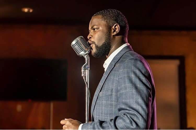 Cameron Webb at the microphone